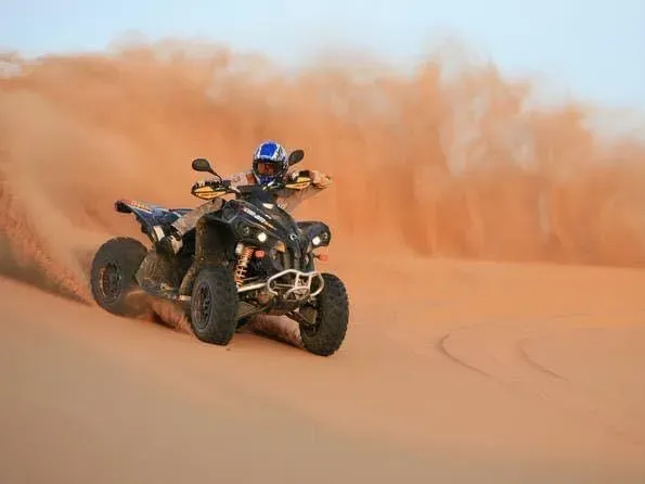 Quad bike desert safari experience on Dubai red dunes